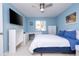 Bright bedroom featuring a built-in desk and ample closet space with large window offering natural light at 5258 Tunbridge Wells Ln # 1902, Orlando, FL 32812