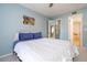 Inviting bedroom with ensuite bathroom and walk-in closet offering comfort and convenience at 5258 Tunbridge Wells Ln # 1902, Orlando, FL 32812