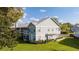A charming two-story home with a screened porch and well-manicured landscaping, perfect for relaxing outdoors at 5258 Tunbridge Wells Ln # 1902, Orlando, FL 32812