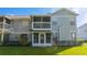 Charming home exterior featuring a screened-in porch, offering a cozy and relaxing outdoor space at 5258 Tunbridge Wells Ln # 1902, Orlando, FL 32812