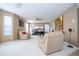 Bright and airy living room with comfortable seating, a ceiling fan, and stylish decor at 5258 Tunbridge Wells Ln # 1902, Orlando, FL 32812