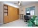 Bright office with large built-in cabinet and ceiling fan, perfect for working from home at 5258 Tunbridge Wells Ln # 1902, Orlando, FL 32812
