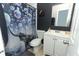 Bathroom with a vanity and artistic elephant themed shower curtain at 558 Tyler Ave, Deltona, FL 32725