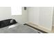 Bedroom showcasing a twin bed, tile floor, and closet with bright, neutral paint at 558 Tyler Ave, Deltona, FL 32725