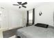 Clean bedroom with basic furnishings and ceiling fan, plus a closet for storage at 558 Tyler Ave, Deltona, FL 32725