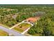 Aerial view showcasing the home's location on a large, wooded lot at 6005 Bancroft Blvd, Orlando, FL 32833