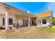 Spacious back porch with tiled flooring and multiple seating areas at 6005 Bancroft Blvd, Orlando, FL 32833