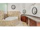 Bright bathroom featuring a jacuzzi tub, mosaic tile, and a spacious vanity with granite countertops at 6005 Bancroft Blvd, Orlando, FL 32833