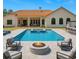 Backyard pool with a fire pit and plenty of seating at 6005 Bancroft Blvd, Orlando, FL 32833