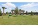 Well-maintained dog park with agility equipment, benches, and plenty of green space for play at 6117 Sandy Springs Ct, St Cloud, FL 34771