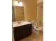 Bathroom with a single sink vanity, toilet, and a shower/tub combo at 6567 Magee Ct, Orlando, FL 32818