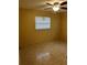 Bedroom with neutral walls, tile flooring, and a window at 6567 Magee Ct, Orlando, FL 32818