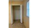 Closet with tile flooring and shutter doors at 6567 Magee Ct, Orlando, FL 32818