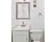 Bathroom featuring white vanity, mirror, modern faucet, toilet, and vent at 713 Saint Matthew Cir, Altamonte Springs, FL 32714