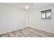 Bedroom featuring wood floors, ceiling fan, window with blinds, and closet at 713 Saint Matthew Cir, Altamonte Springs, FL 32714