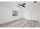 Bedroom featuring light wood floors, ceiling fan, window, and closet at 713 Saint Matthew Cir, Altamonte Springs, FL 32714
