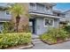 Charming townhouse with well-maintained landscaping, a brick chimney and direct parking at 713 Saint Matthew Cir, Altamonte Springs, FL 32714