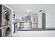 Modern kitchen featuring stainless steel appliances and a stacked washer/dryer at 713 Saint Matthew Cir, Altamonte Springs, FL 32714