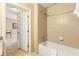 Bathroom featuring a tub shower with tile surround at 8763 Worldquest Blvd # 5306, Orlando, FL 32821