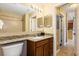 Bathroom featuring a vanity, toilet, mirror and shower stall at 8763 Worldquest Blvd # 5306, Orlando, FL 32821
