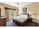 Cozy bedroom with a large window and plush bedding for a relaxing retreat at 8763 Worldquest Blvd # 5306, Orlando, FL 32821