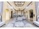 Grand community room featuring soaring ceilings, elegant decor, and comfortable seating at 8763 Worldquest Blvd # 5306, Orlando, FL 32821