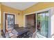Relaxing patio with a table and seating, perfect for enjoying the outdoors at 8763 Worldquest Blvd # 5306, Orlando, FL 32821