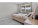 Neutral bedroom with a single bed, carpeted floors, and a window with natural light at 889 Terrapin Dr, Debary, FL 32713