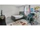 Comfortable bedroom with a desk, chair, rug, and decor for leisure at 889 Terrapin Dr, Debary, FL 32713