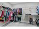 Spacious walk-in closet with ample shelving and storage for organized and convenient wardrobe management at 889 Terrapin Dr, Debary, FL 32713