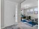 Inviting foyer with a light-filled study visible through the doorway, wood flooring, and an elegant entrance at 889 Terrapin Dr, Debary, FL 32713