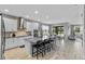 Modern kitchen with a center island, stainless steel appliances, and an open floor plan at 889 Terrapin Dr, Debary, FL 32713