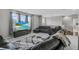 Inviting living room with comfortable seating and large TV, ideal for entertainment and relaxation at 889 Terrapin Dr, Debary, FL 32713