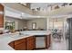 Stylish kitchen offers modern stainless-steel appliances, granite countertops, and a breakfast bar at 901 Dorset Pl, Davenport, FL 33896