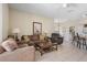 Inviting living room with comfortable seating and natural light, perfect for relaxing and entertaining at 901 Dorset Pl, Davenport, FL 33896