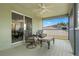 Upstairs balcony features a comfortable seating area and open views at 901 Dorset Pl, Davenport, FL 33896