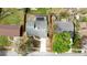Aerial view of home featuring a large backyard with a screened pool and a fence at 924 Mill Road Ln, Port Orange, FL 32127