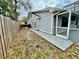 The backyard shows access to pool, AC unit and fencing for the property at 924 Mill Road Ln, Port Orange, FL 32127