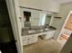 Bathroom with double sinks and an attached bathtub at 924 Mill Road Ln, Port Orange, FL 32127