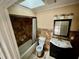 Bathroom featuring tiled walls, vanity, toilet, and shower at 924 Mill Road Ln, Port Orange, FL 32127