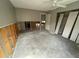 Bedroom with an open wall, neutral color scheme, ceiling fan, and closet at 924 Mill Road Ln, Port Orange, FL 32127
