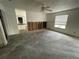 Bedroom featuring an open wall, ceiling fan, and window at 924 Mill Road Ln, Port Orange, FL 32127