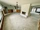 A light and airy living room with a beautiful chandelier and plenty of natural light at 924 Mill Road Ln, Port Orange, FL 32127