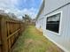 A long view of the back yard, as seen from the side of the house at 924 Mill Road Ln, Port Orange, FL 32127