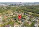 An aerial view of the house and neighborhood with a reference to Daytona International Speedway at 109 Sweetwater Oaks Ln, Daytona Beach, FL 32114
