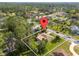 Residential home situated within mature trees in established community at 109 Sweetwater Oaks Ln, Daytona Beach, FL 32114