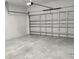 Spacious two-car garage, offering plenty of room for vehicles and storage at 13215 Sw 41St Ct, Ocala, FL 34473