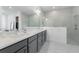 Bright bathroom with dual sinks, spacious countertop, and modern glass shower at 13589 Mcmillan Dr, Orlando, FL 32827
