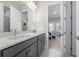 Bathroom with modern double vanity, ample counter space, and stylish fixtures at 13589 Mcmillan Dr, Orlando, FL 32827