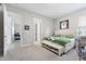 Spacious bedroom with carpet, neutral paint, and a view to another bedroom at 13589 Mcmillan Dr, Orlando, FL 32827